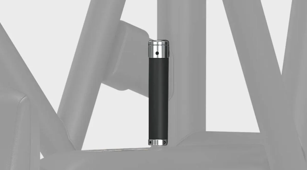 Close-up of a vertical grip handle with chrome end caps on the Matrix Low Row machine in Matte Black.
