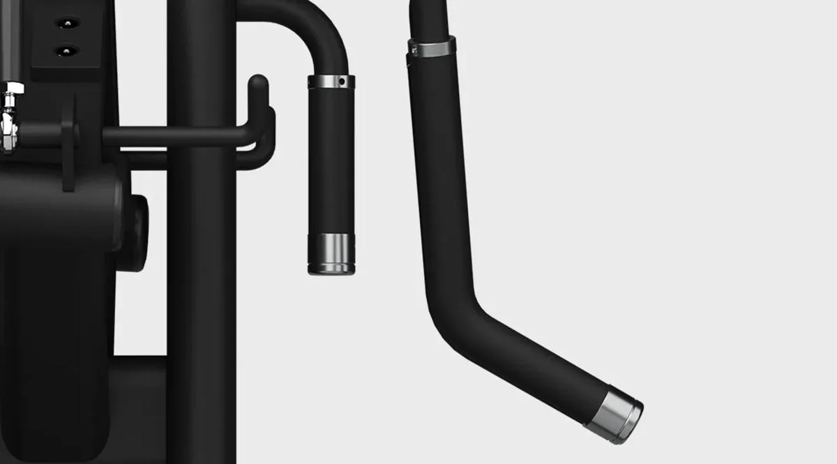 Close-up of the vertical hand grips on a Magnum Seated Lateral Raise in Matte Black.