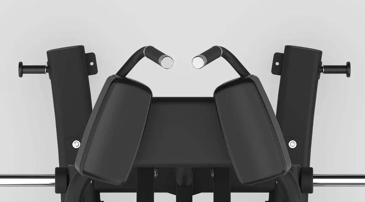 Front view of the upper handle and shoulder pad area on a Matrix Fitness strength machine in Matte Black, with angled grip handles and contoured pads.
