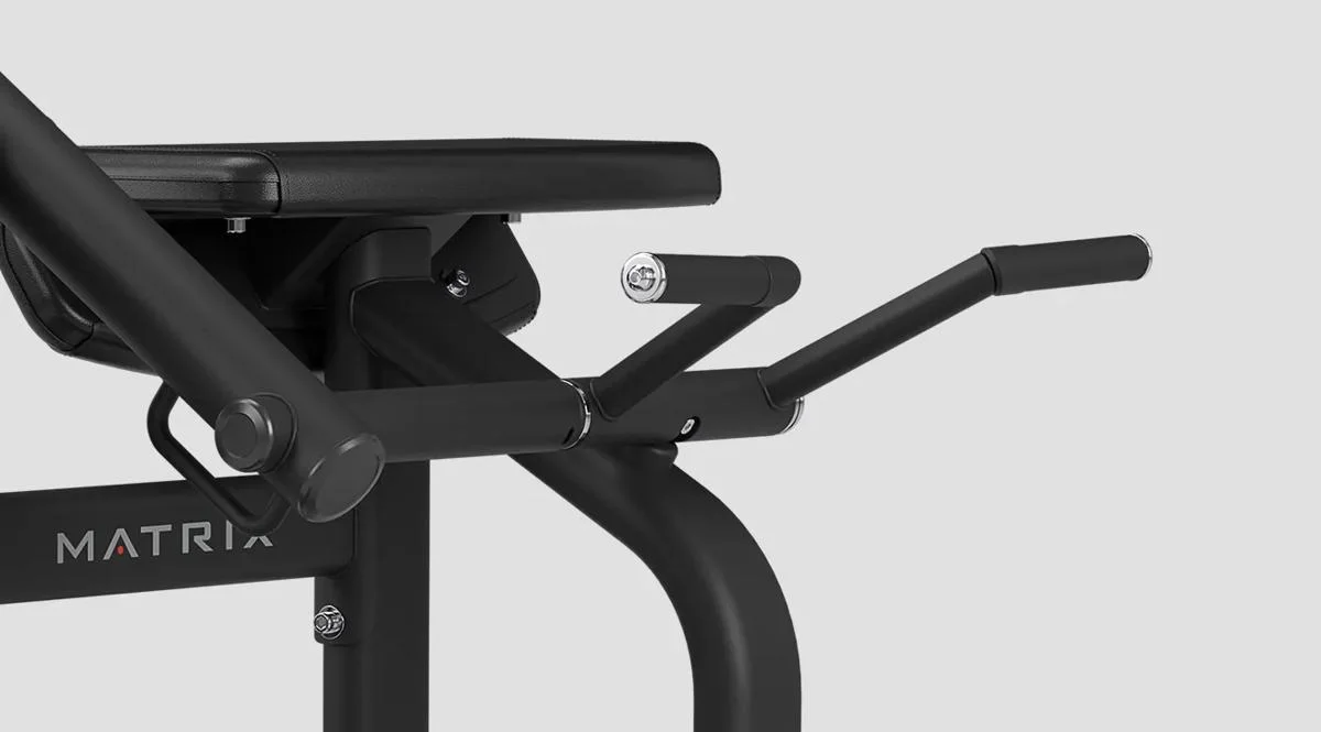 Close-up of the angled grip handles and padded arm support on a Matrix Fitness Biceps Curl machine in Matte Black.