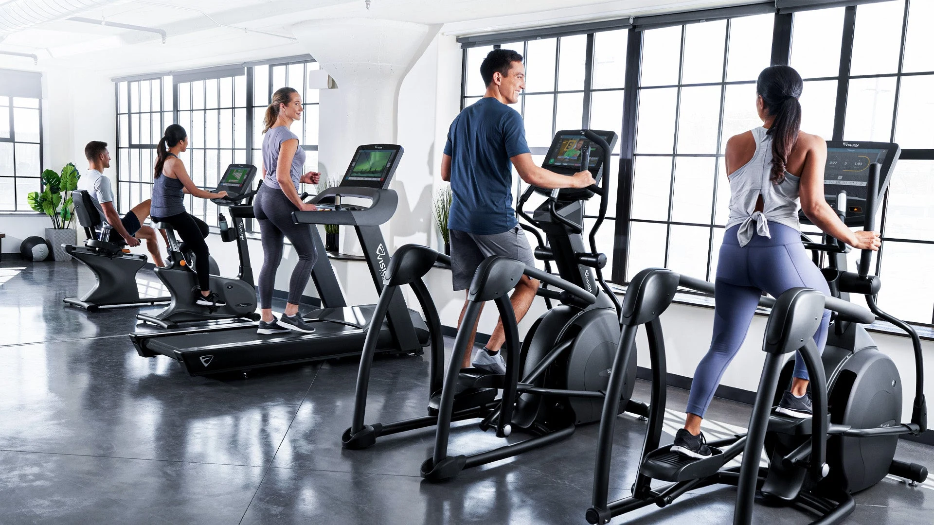 Cardio training on VISION equipment in a bright space